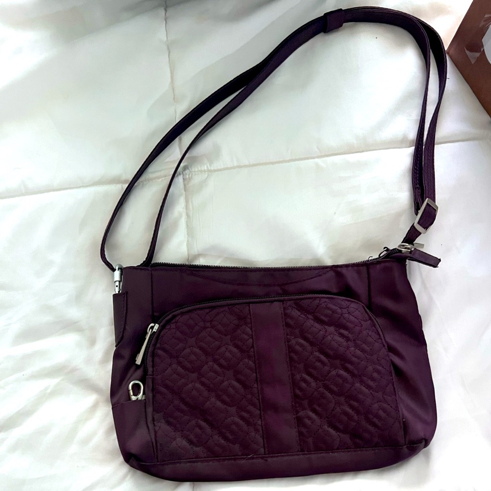 Travelon never used plum locking purse